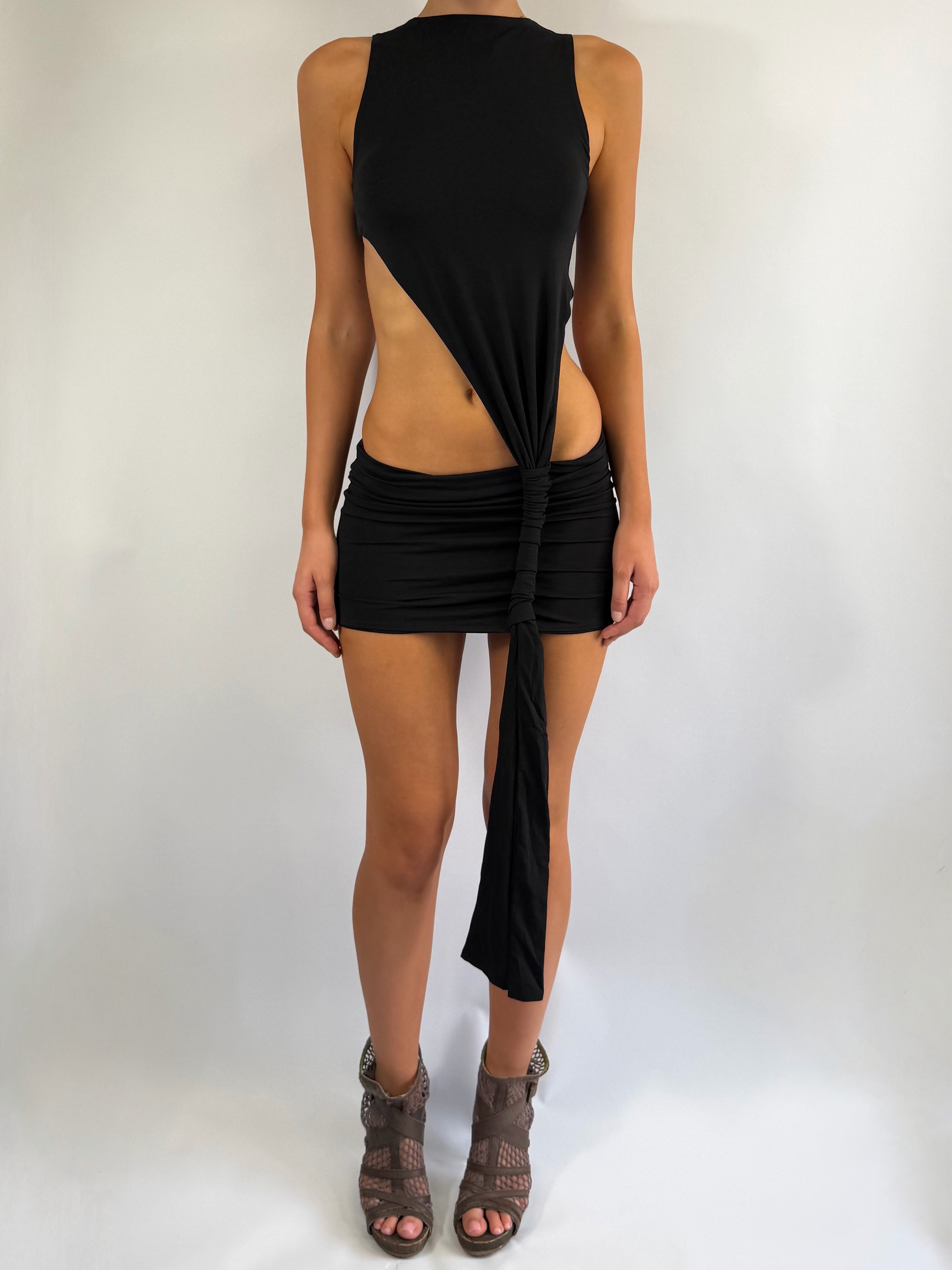 ASYMMETRIC KNOT LOW RISE MINI DRESS IN BLACK