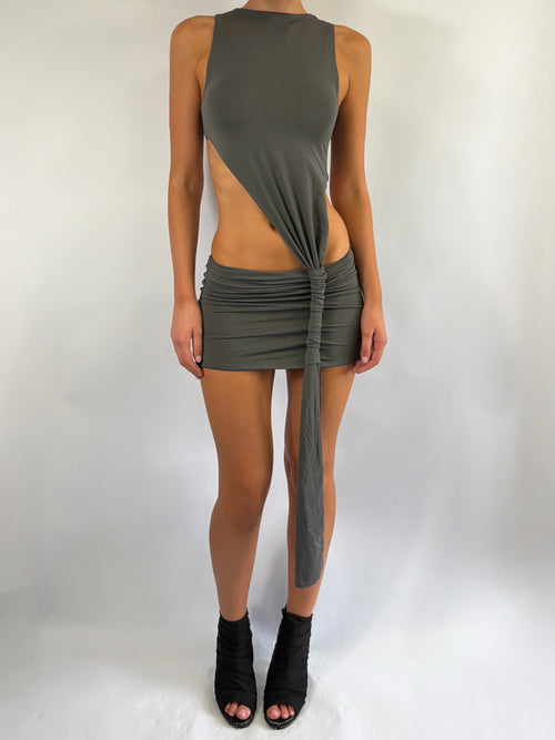 ASYMMETRIC KNOT LOW RISE MINI DRESS IN STONE