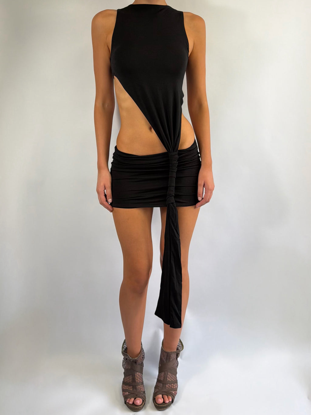 ASYMMETRIC KNOT LOW RISE MINI DRESS IN BLACK