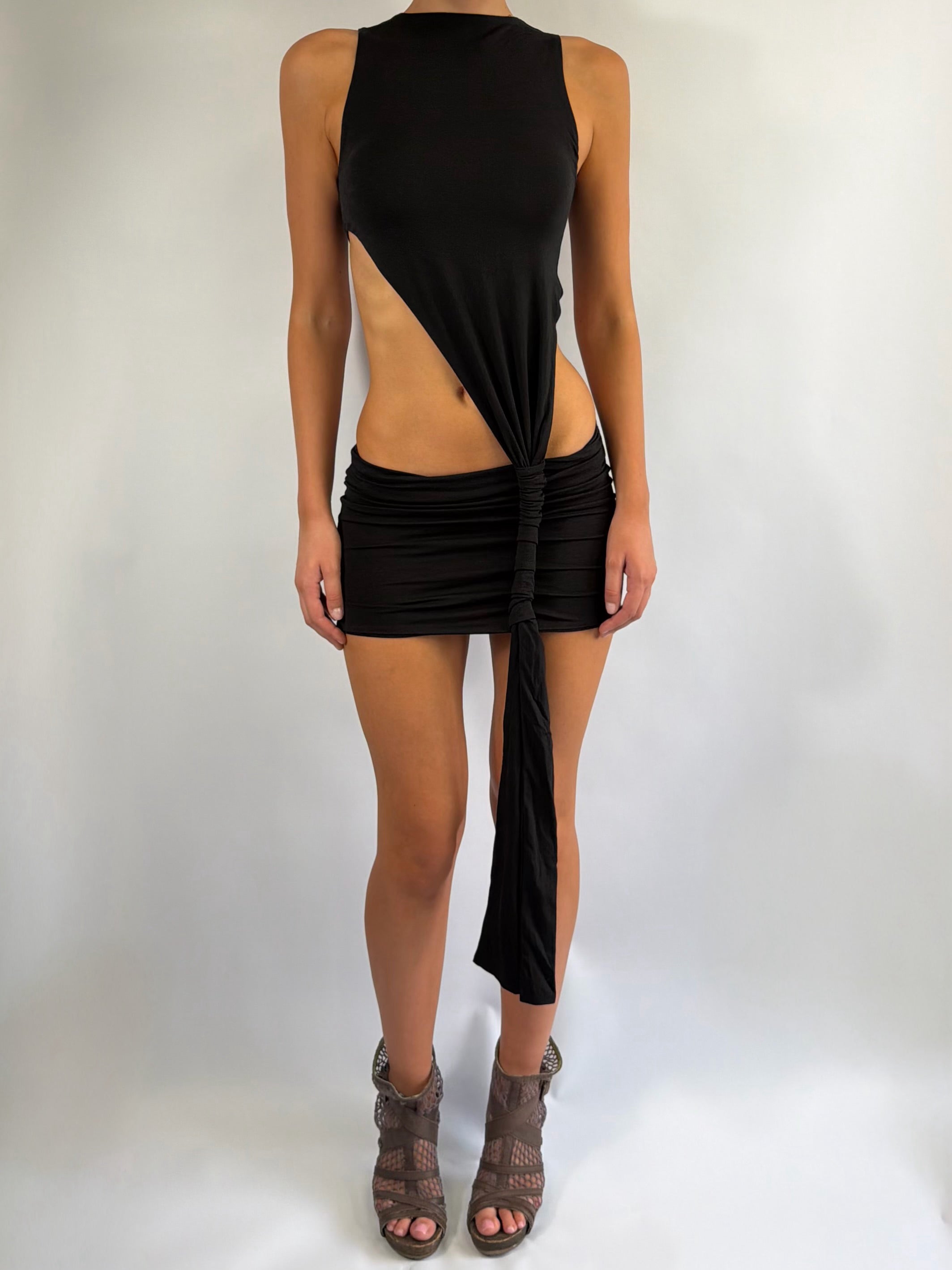 ASYMMETRIC KNOT LOW RISE MINI DRESS IN BLACK