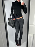 VINTAGE ULTRA LOW RISE RIPPED JEANS